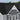 Black fish-scale asphalt shingles on gable roof surface