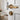 Brass door lock cylinder with thumbturn and keyhole on white door