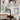 Black pull-out kitchen faucet with chrome sprayer showing multiple spray modes