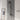 Black shower set with rainfall shower head, handheld spray, and dual controls