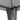 Gray gazebo corner joint with support pole and gathered curtain fabric at the seam.