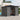 Gray metal garden storage shed with sliding door open, shelves and tools inside