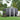 Anthracite metal garden storage shed with door panel and apex roof