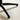 Black swivel chair leg with metal frame on light rug
