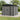 Metal garden storage shed with apex roof, sliding door panel and dark grey siding