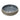 Round ceramic vessel sink with dark speckled interior, leaf border, and center drain hole