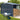 Metal garden storage shed with log compartment, sliding doors and apex roof vents, dark blue