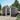 8x10 metal garden storage shed, dark gray panels, sliding door, apex roof, vents