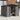 Metal garden storage shed with apex roof and sliding doors, open interior tools