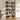 Industrial 5-tier shelving unit with dark wood boards and black metal frame for display