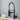 Black kitchen sink faucet with pull-down sprayer and side spray control