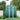 Dark green metal storage shed with double doors and two roof vents