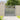 Gray wooden garden gate with vertical pickets and horizontal rails, latch and hinges