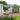 Wall-mounted canopy gazebo with black frame and tinted clear polycarbonate roof