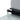 Wind shield hinge detail on foldable camping kitchen stand, grey panel