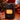 Portable black gas heater with glowing infrared grille and caster wheels