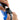 Close-up of retractable leash mechanism with release latch and black rope inlet