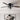 Ceiling fan light fixture with four glass shades and dark blades, pull-chain switch