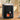Black 5L digital touchscreen air fryer with open drawer and glowing heating area