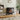Freestanding dark electric fireplace heater with glass doors and LED flame display, on stand