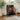 Freestanding black LED electric fireplace with ember and flame effect in glass window
