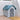 Blue plastic dog house entrance with mesh door and vented side panel