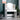 White Hollywood vanity desk with lighted mirror and open storage shelves
