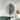 Round LED bathroom mirror with backlit ring and touch icons on reflective surface
