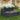 2-Tiers raised metal garden bed, dark charcoal, front planter with multicolor stones