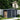 8x4ft Metal Garden Storage Shed with Log Store Apex Roof Sliding Doors