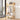 Freestanding wooden coat rack with top shelf, coat hooks, and lower shoe storage shelves