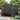 Anthracite storage shed front view with double door, handle, and gable roof vents