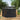 Metal garden storage shed with closed double doors, black exterior and latch handle