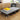 4-Fold Metal Sponge Folding Bed with gray fabric mattress and casters, yellow pillow on top