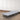 4-Fold Folding Bed with light gray upholstery mattress, folded-flat on rolling casters