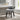 Silver grey velvet accent stool with curved back, tufted top, nailhead trim, dark legs