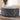 Round Ottoman in Linen Grey with Studded Edge