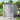 Gray plastic garden storage shed with vented side panel and double sliding doors