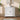White bathroom vanity cabinet with two louver shutter doors and center knob