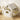 White playhouse panel with grey-and-white striped canopy and activity block table