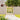 Wooden garden gate set in fence opening, diagonal braces and black security latch
