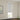 White zebra roller blind installed in a window with horizontal stripe pattern