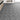 Marble-effect vinyl floor covering in dark gray with white veiny pattern