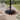 Umbrella stand base with vertical pole and caster wheels, dark gray