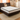 Single pocket spring hybrid mattress with white dimpled top and black edge trim