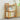 3-tier bamboo book storage shelf with open side frame and slatted base, natural