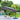 Dark grey square cantilever parasol with open canopy and large base