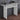 White entryway console table with open center shelf and long top for decor